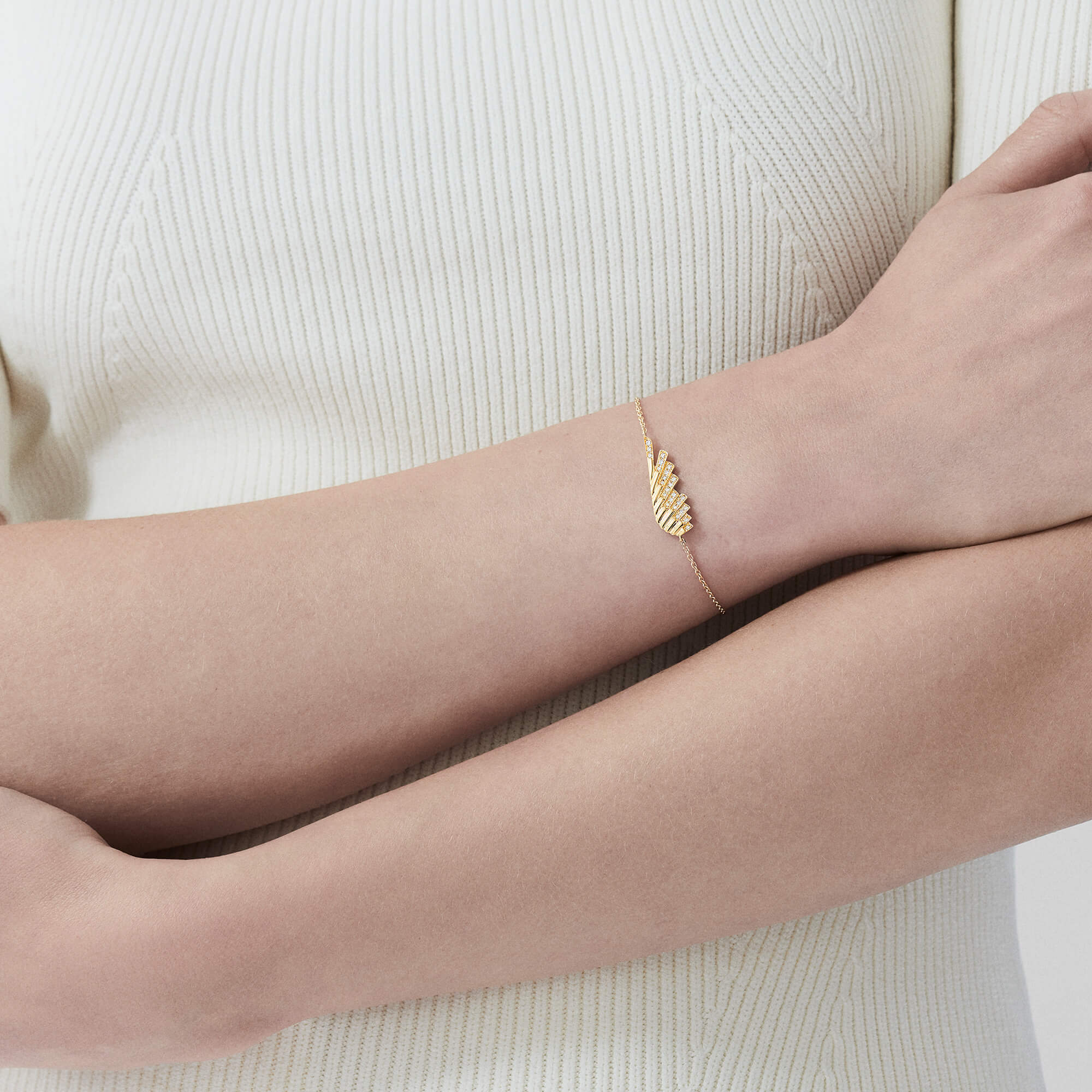 Garrard Wings Rising collection Mini Icon Diamond Bracelet in 18ct Yellow Gold 2018639 on model